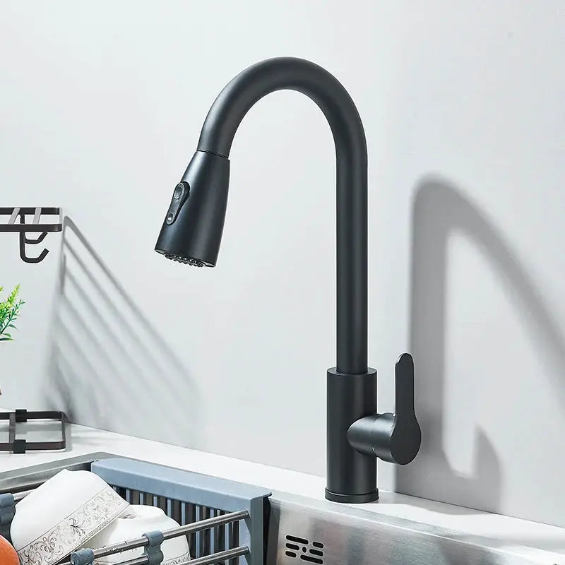 Kitchen faucet in black matte finish with pull-out spray head, deck-mounted, single-lever.