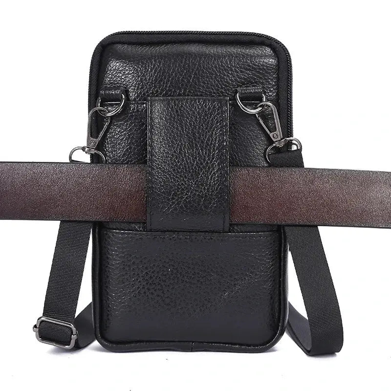 Men's black genuine leather waist bag with crossbody strap and metal hardware