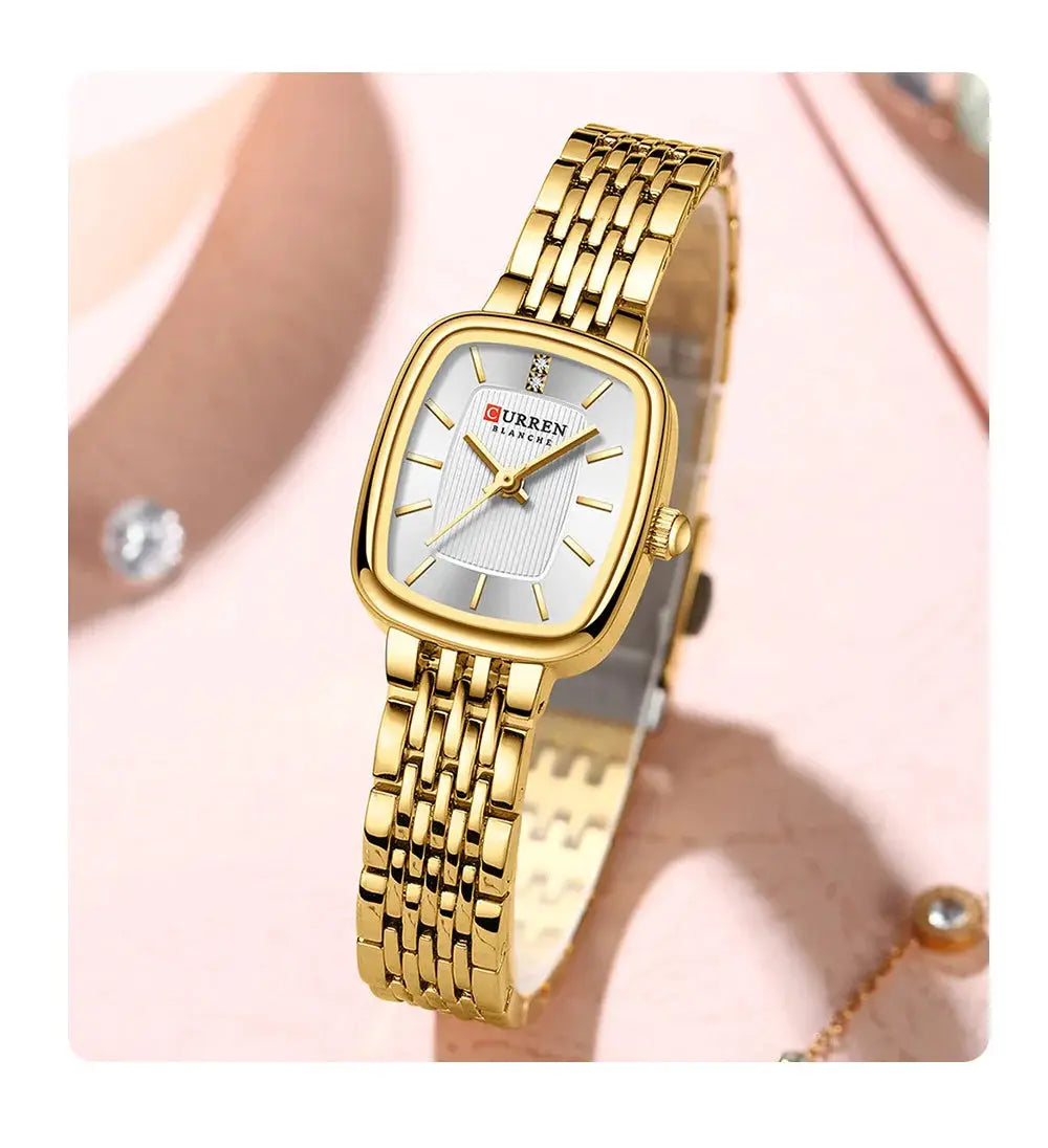 CURRN 9093 women's quartz watch, gold-tone stainless steel bracelet with diamond-accent dial