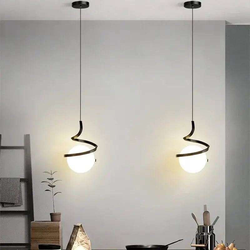 Nordic LED pendant light pair with black curved metal arms around white glass globes, hanging from cords