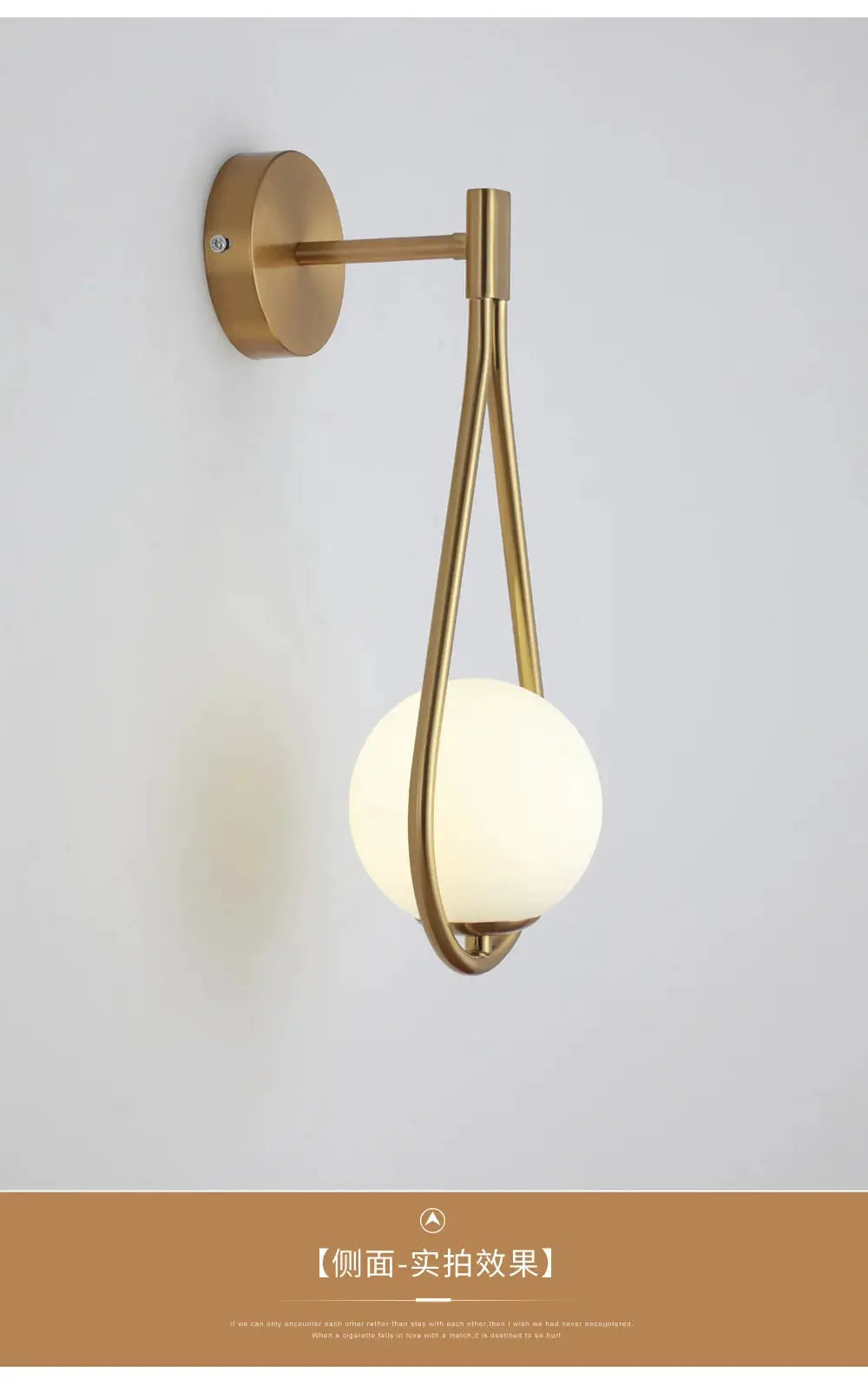 Brass-finish wall lamp with a glass globe LED light, Nordic minimalist bedroom lighting by Simples Market