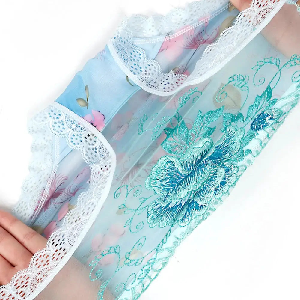Lace briefs with teal floral embroidery, sheer mesh panel and white lace trim
