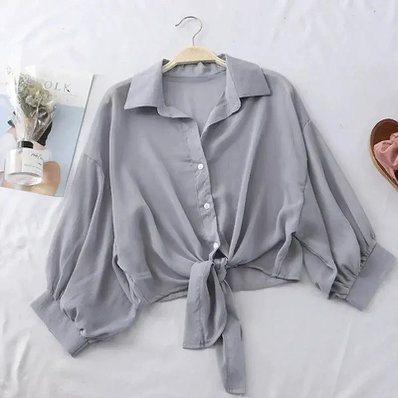 Simples Market chiffon tie-waist blouse, light gray, puff sleeves, button front.