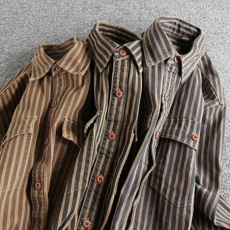 Three striped long-sleeve collared shirts in brown, olive, and navy with chest pockets and brown buttons.