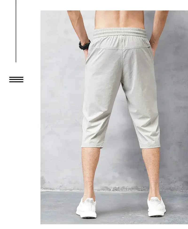 Men's 3/4 length shorts, light gray quick-dry nylon Bermuda with elastic waistband
