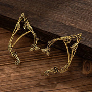 Pair of gold-tone elf leaf ear clips by Simples Market, wedding fairy jewelry