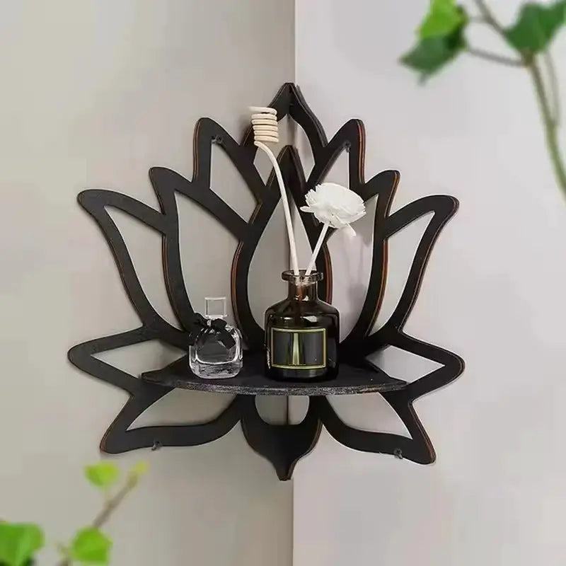 Wooden lotus wall-mounted aromatherapy shelf with candle holder, diffuser sticks, and small bottle.