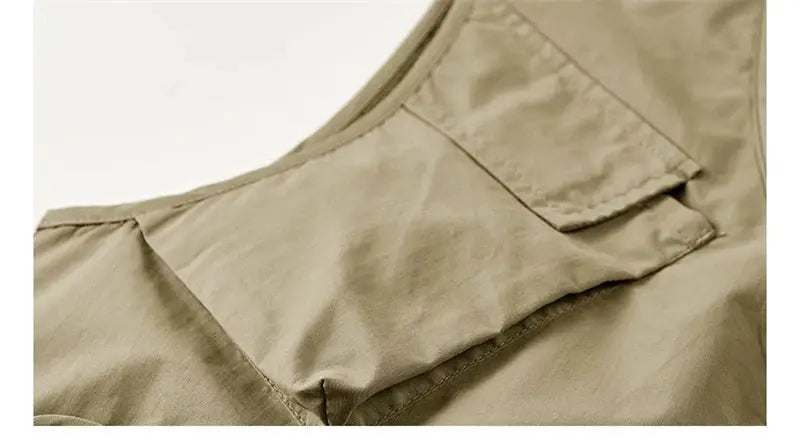Men's khaki sleeveless vest with multiple pockets for outdoor fishing