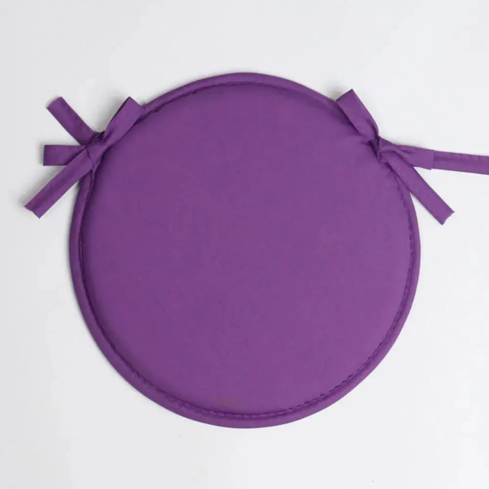 Purple round chair cushion with drawstring ties, 30x30 cm, washable.