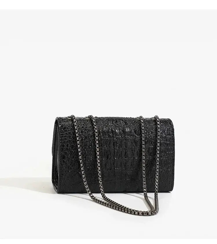 Women's luxury croc-embossed black crossbody handbag by Simples Market with chain strap