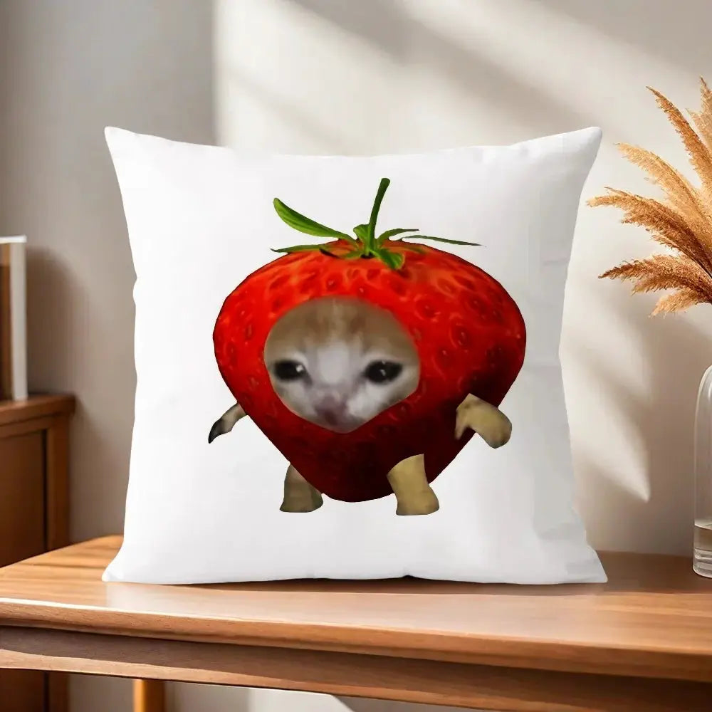 Cushion cover with white background featuring a cute cat inside a red strawberry design