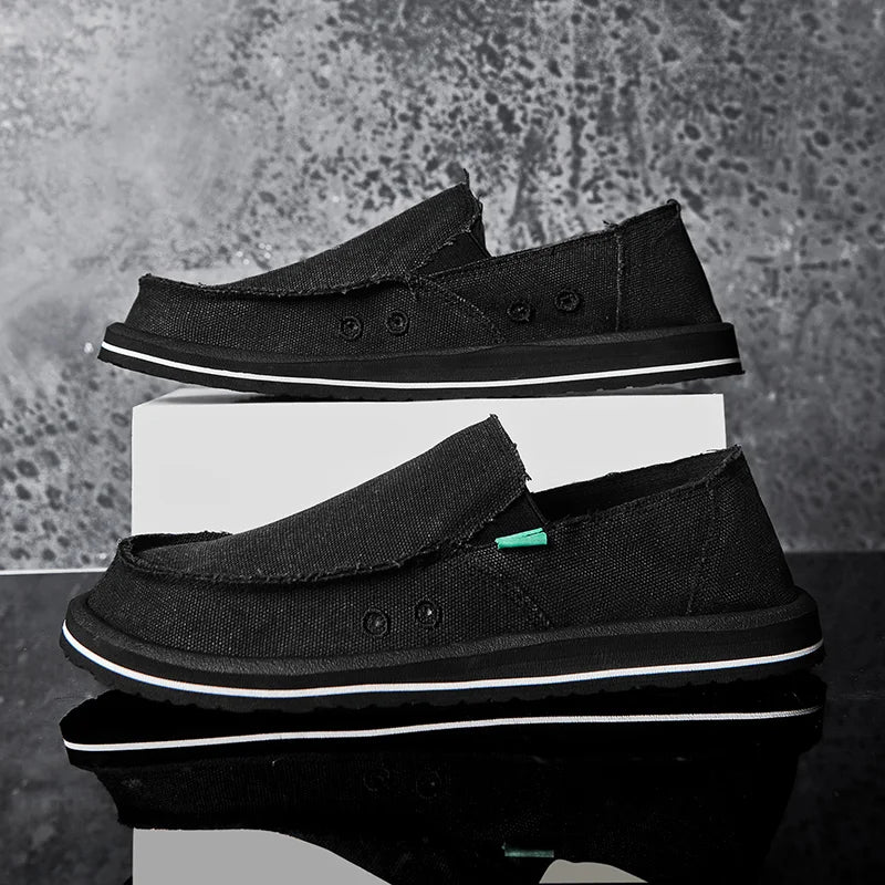 Men's black canvas loafers with white sole, low-top casual shoes (two shown)