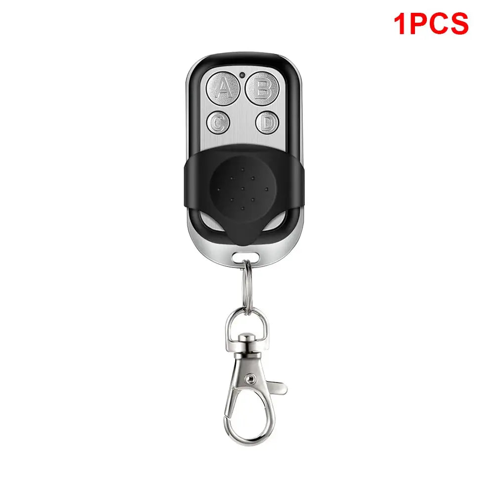 Universal four-button garage door remote, 433MHz clone with fixed learning rolling code and keychain