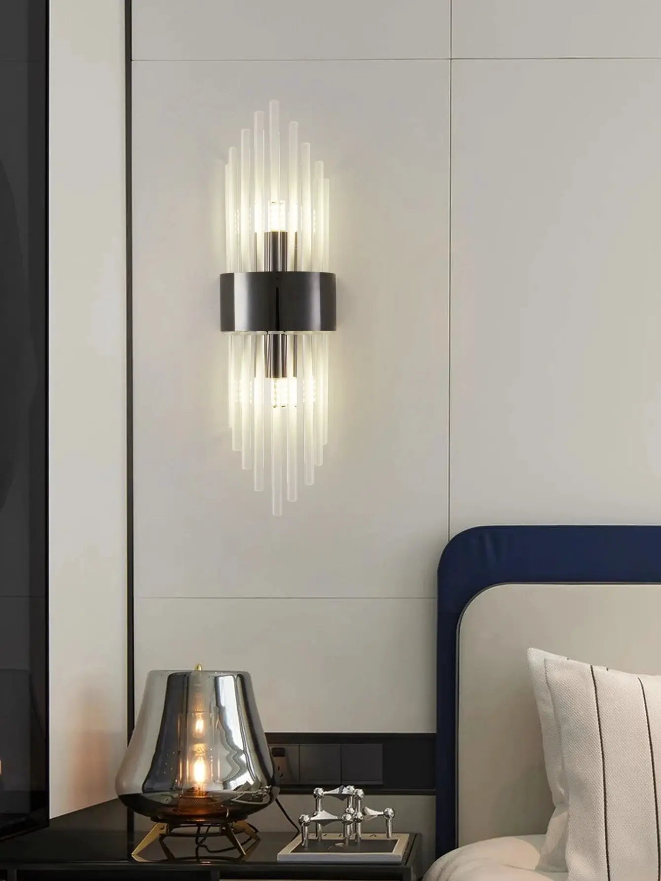 Gold and black stainless steel crystal wall sconce with clear vertical glass rods, G9 light source