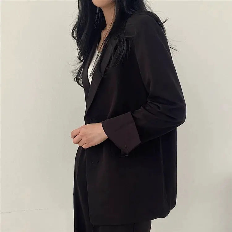Simples Market black blazer two-piece set for women, featuring a long-sleeve blazer and matching pants.
