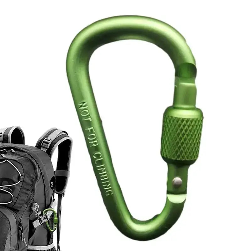 Green aluminum alloy D-shaped carabiner with screw-lock for camping and hiking, shown with a backpack