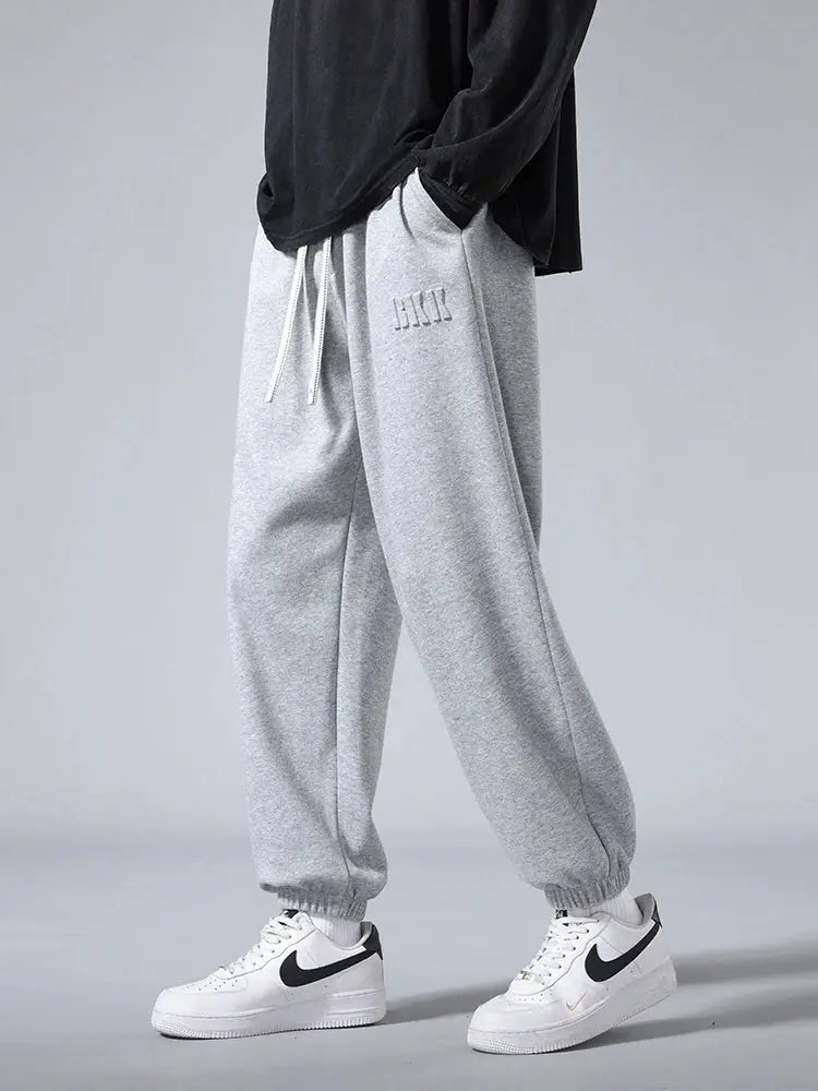 Men's gray cotton-polyester jogger sweatpants with drawstring waist and cuffed ankles, hip-hop baggy fit; sizes 6XL-8XL