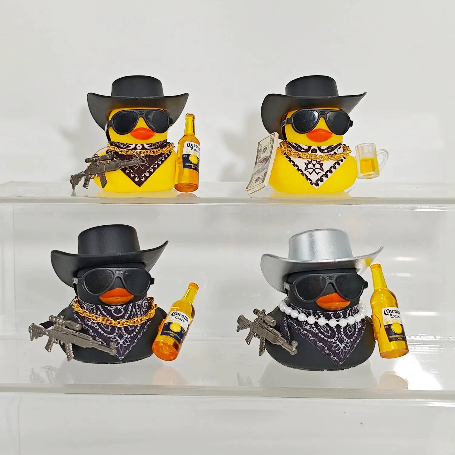 Cowboy rubber duck car ornaments set of 4: yellow ducks with black hats, sunglasses, bandanas, each with a gun and beer.
