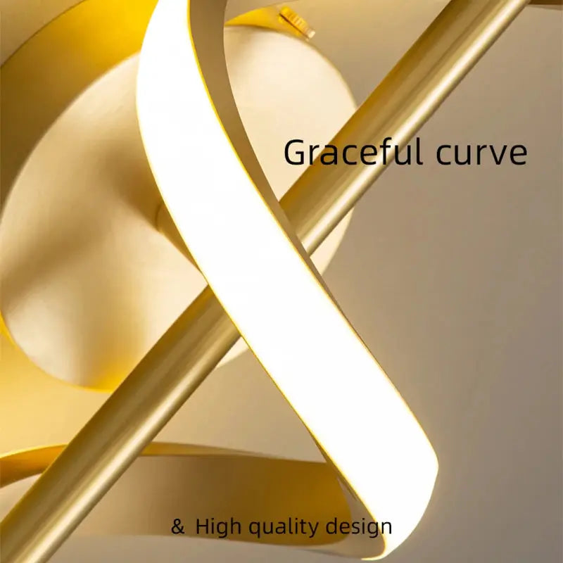 Lustre LED pendant light by Simples Market in gold metal with graceful curved spiral design