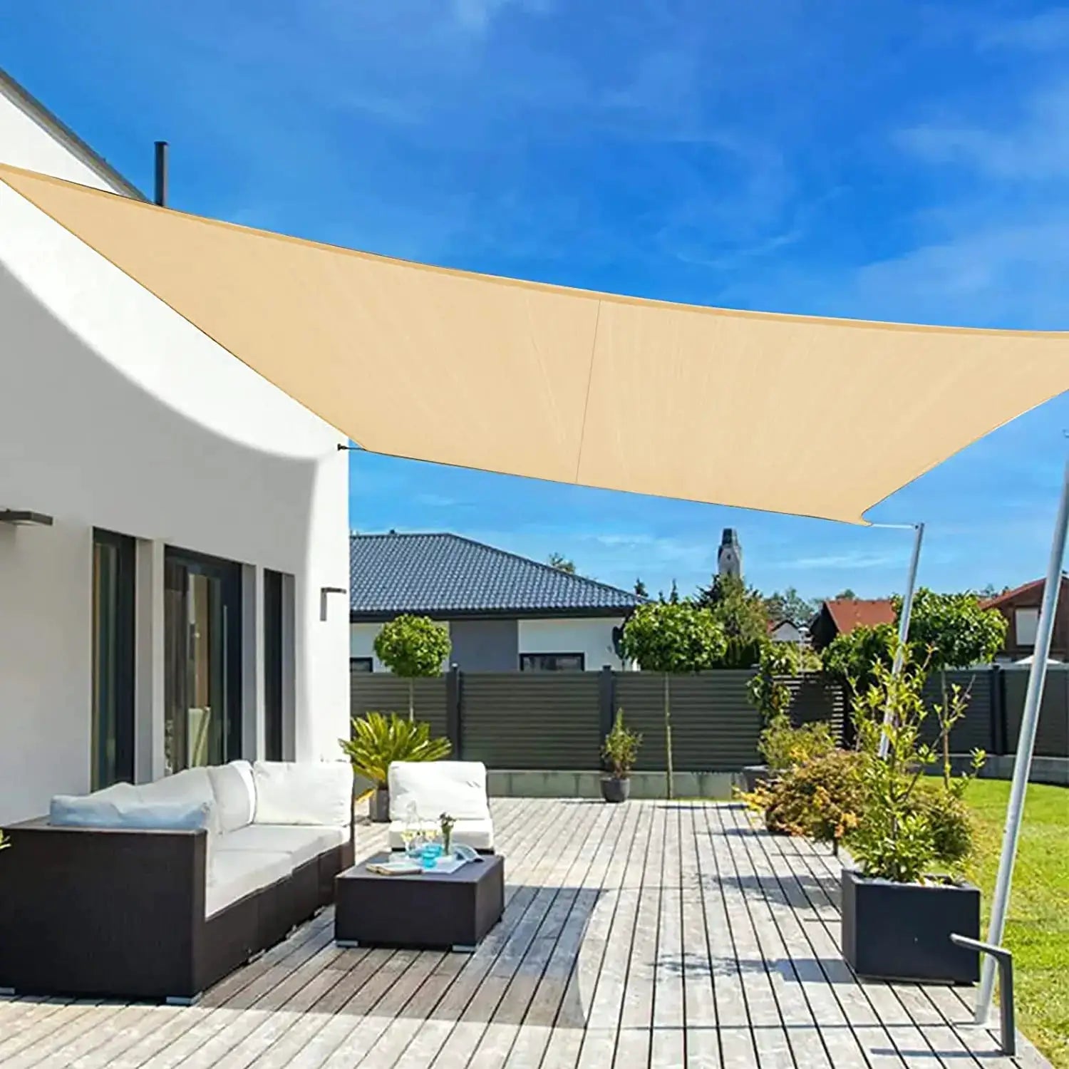 Waterproof beige rectangular sun shade sail canopy by Simples Market over an outdoor patio with seating.