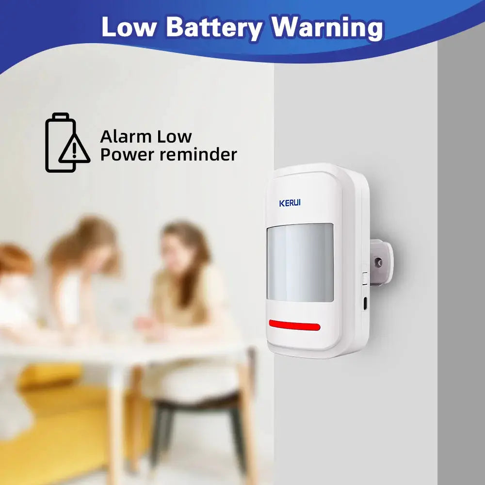 KERUI HW19 white PIR motion sensor alarm mounted on wall with red indicator light