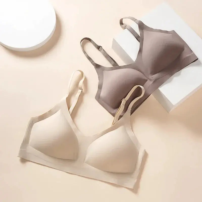 Two seamless wireless bras in beige and taupe; soft-support, breathable, no steel ring.