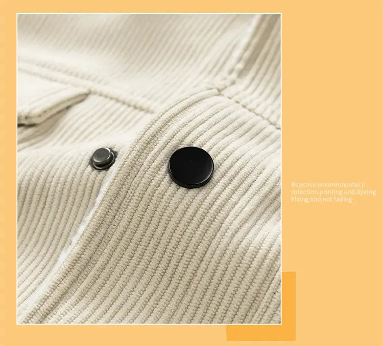 Men's beige corduroy coat close-up with black metal snap buttons