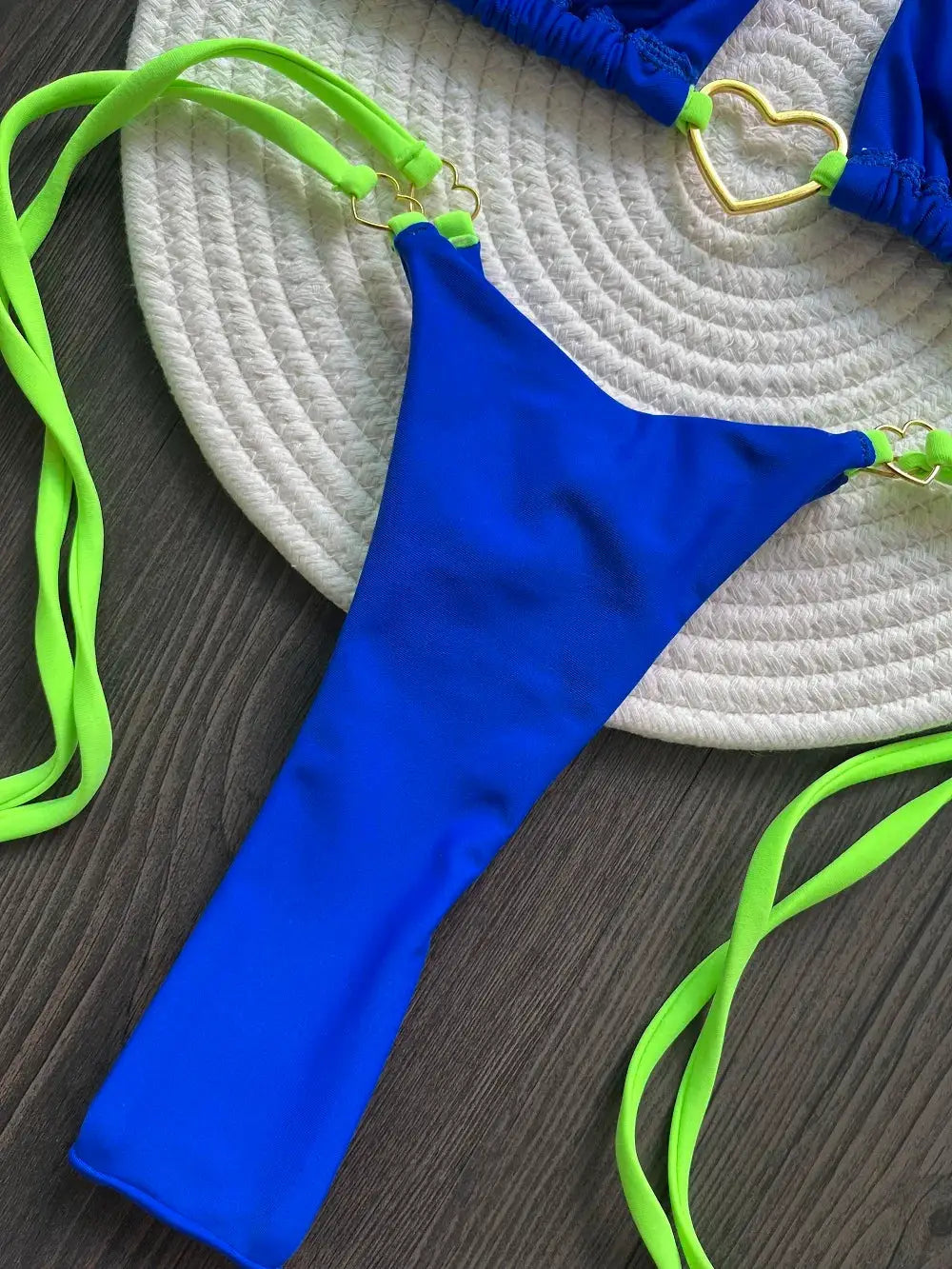 RUOTONSEPT blue triangle bikini bottom with neon green straps and gold heart rings