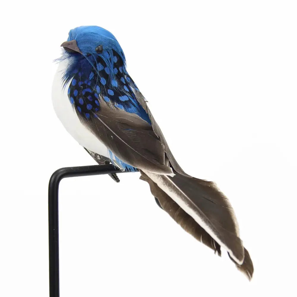 Artificial blue feather sparrow garden decoration perched on a black metal stand