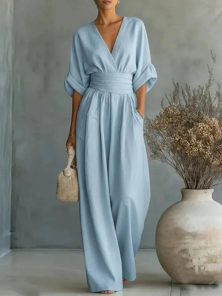 Waist V-neck jumpsuit, light blue solid color, mid-sleeve, wide-leg silhouette, Simples Market