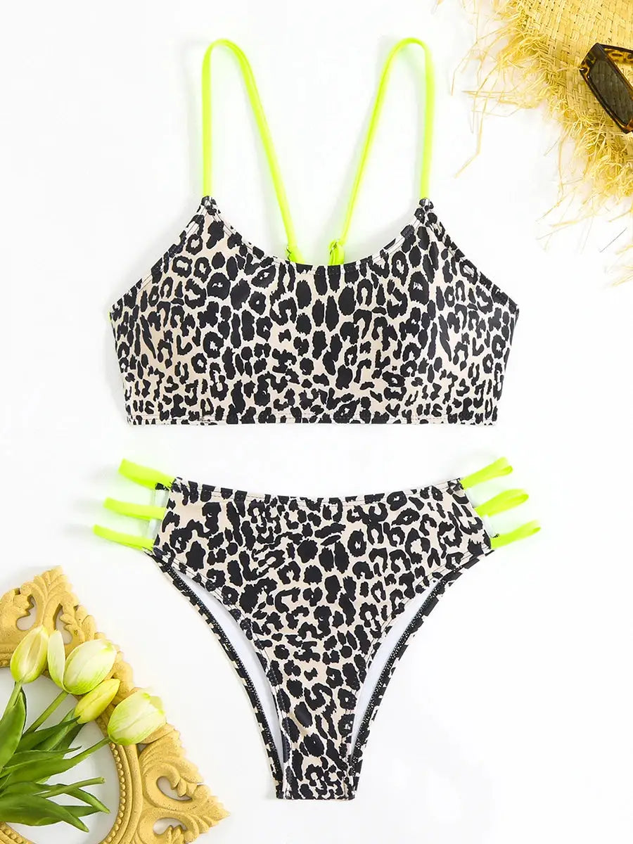 Two-piece leopard print bikini set with neon lime straps, padded top, and neon-accent bottoms