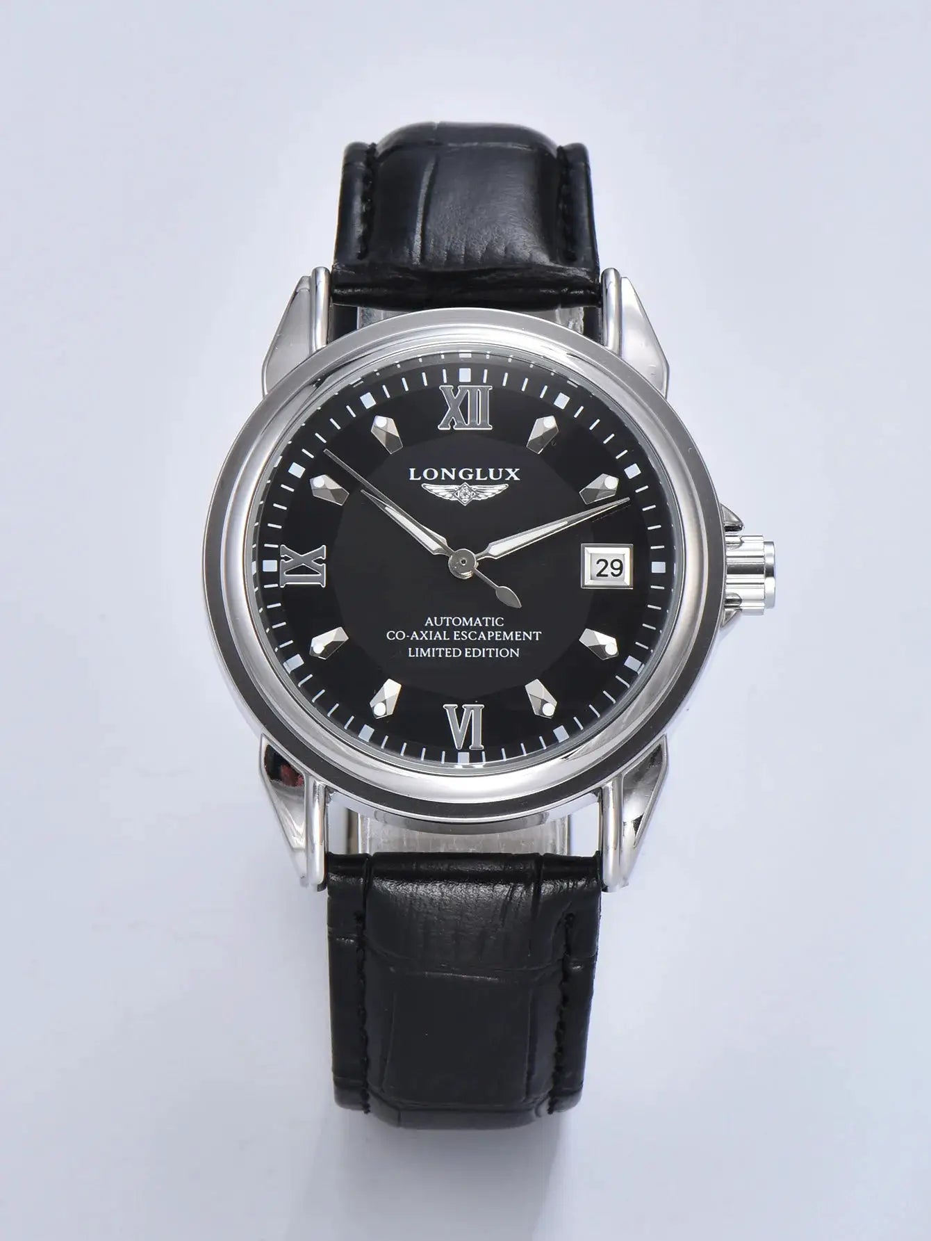 Men's Longlux automatic watch with black dial, date window, silver case, and black leather strap.