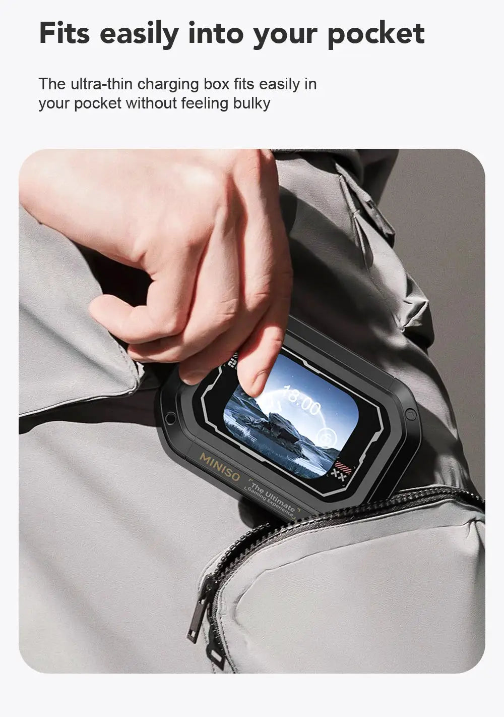 AI MINISO M98 wireless headset charging case clipped to a backpack, rugged black with LCD display