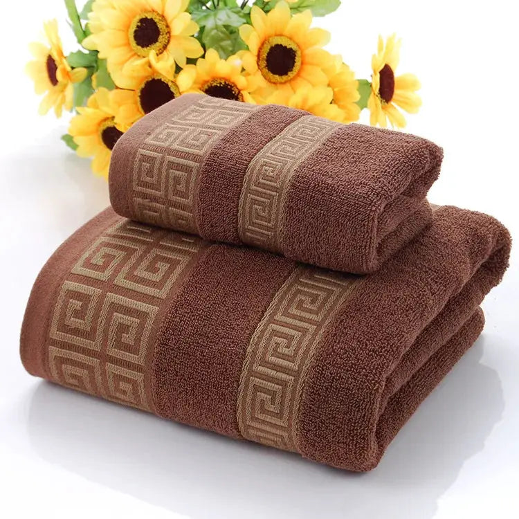 Two-piece brown bathroom towel set, 100% cotton with embroidered geometric band pattern