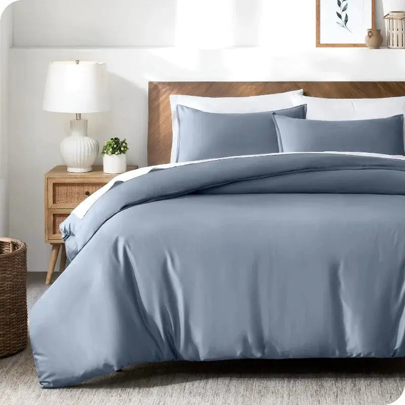 Summer Cooling 3pc duvet cover set Simples Market in silky blue-gray Lyocell bamboo with 2 white pillowcases on a bed