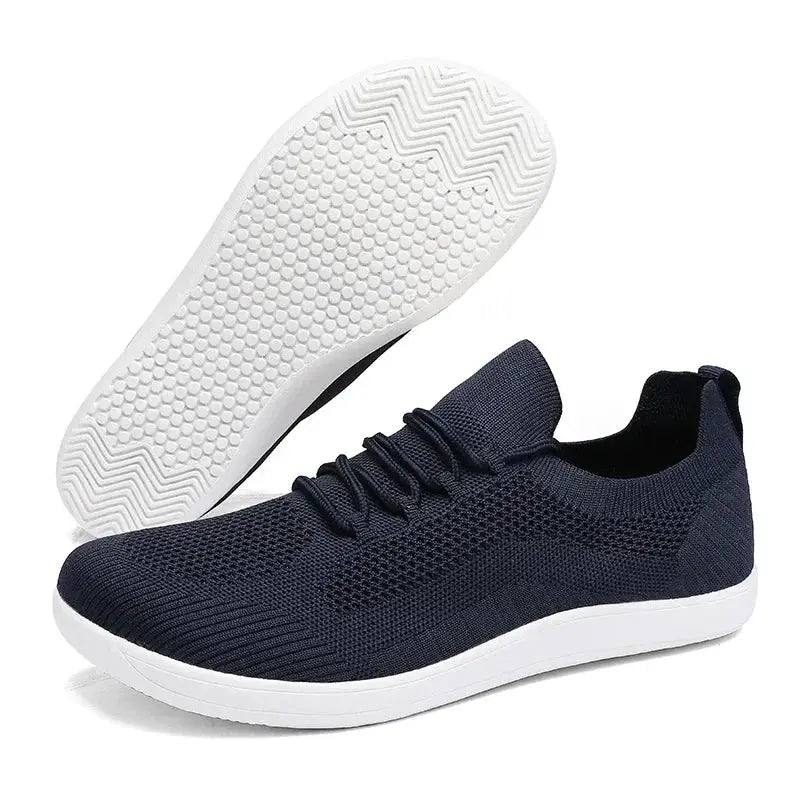 Pair of men's navy knit mesh athletic shoes with white sole; breathable wide-toe design by Simples Market.