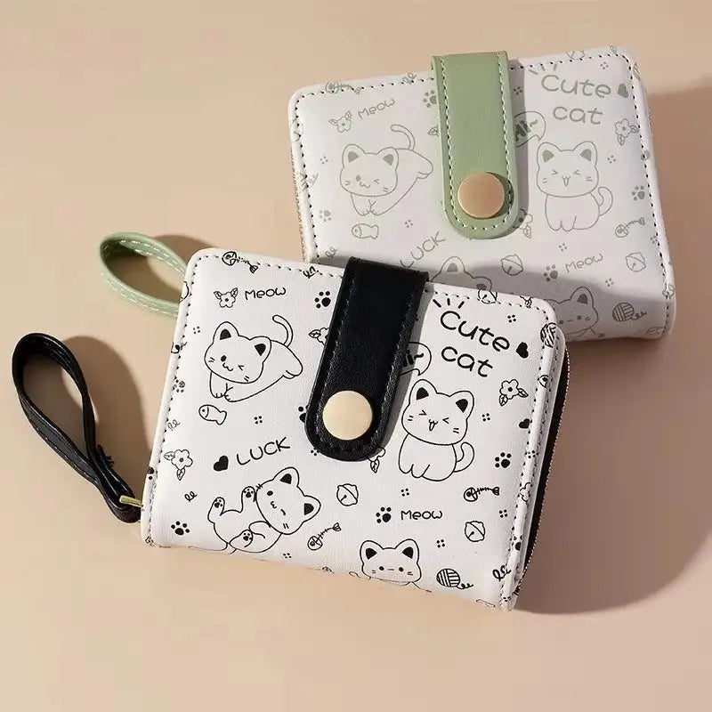 Cat-print wallet set for women by Simples Market, white wallets with black and green straps and zipper closure (2)