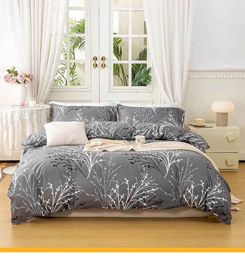 Leaf floral duvet cover set, gray with white botanical pattern; includes 1 duvet cover and 2 pillowcases.