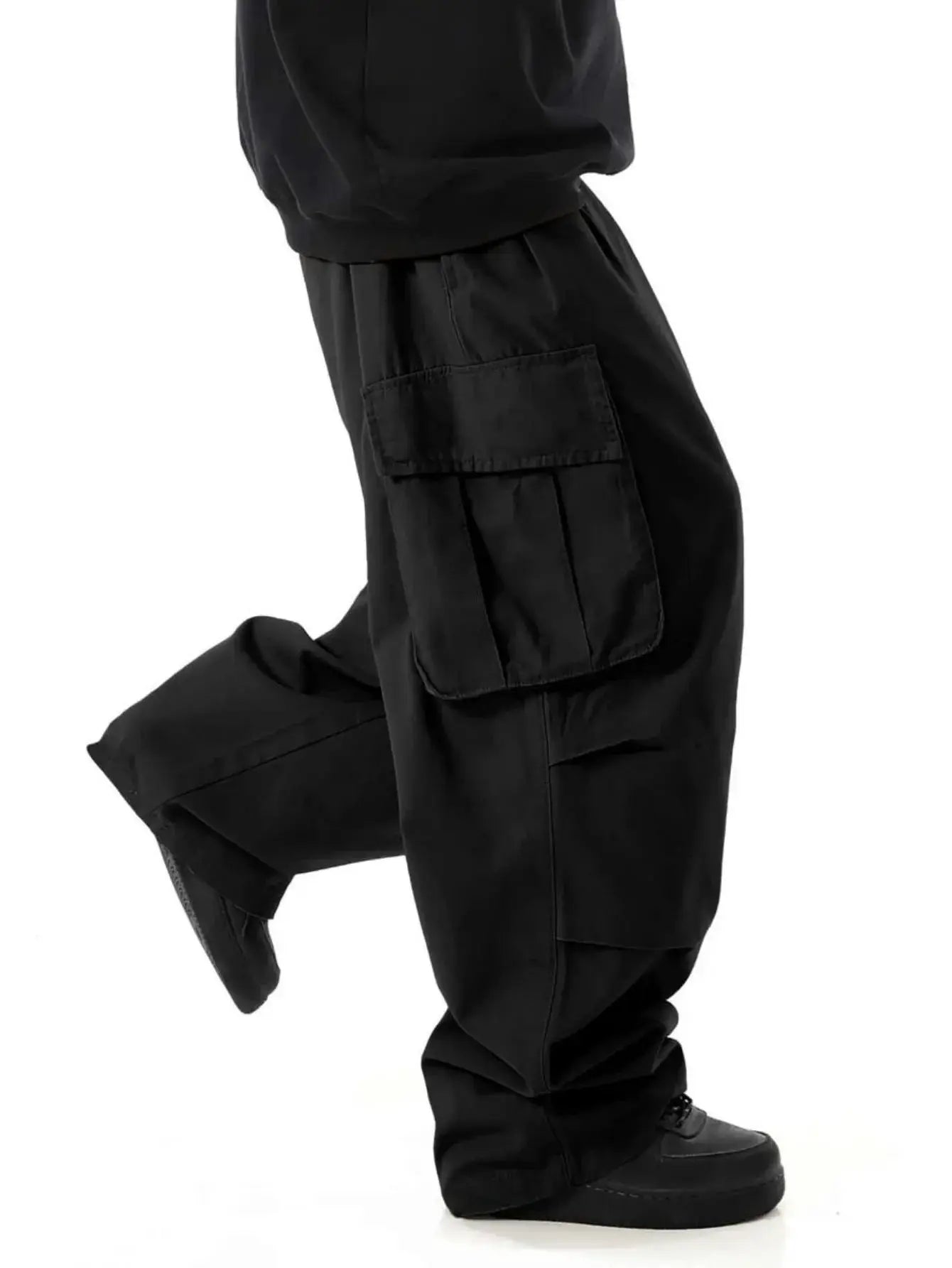 Plus-size men's workwear cargo pants, black with wide legs and large thigh pocket.