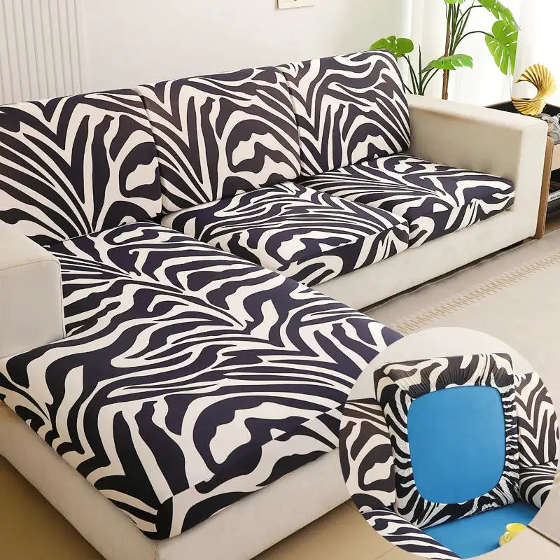 Sofa slipcover set in black and white zebra print for L-shaped couch with chaise