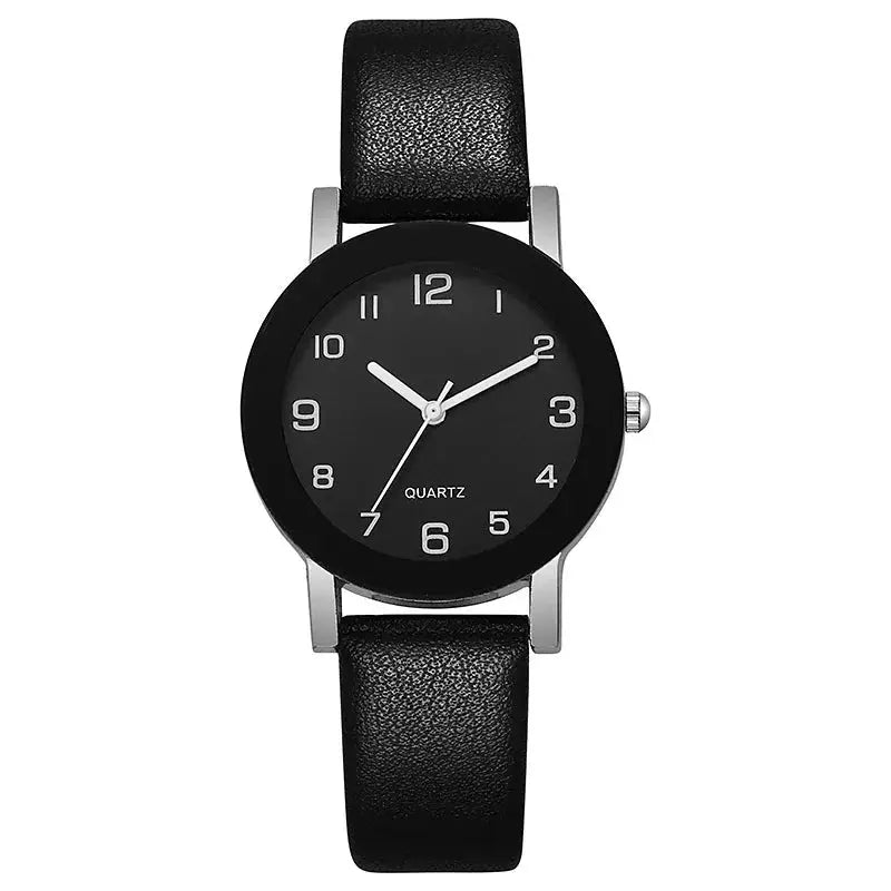 Wristwatch with black leather strap, silver case, black dial, Arabic numerals, quartz movement.