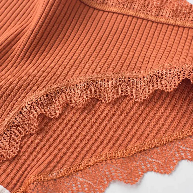 4-pack lace wavy-trim bikini panties in orange ribbed fabric with scalloped lace edges