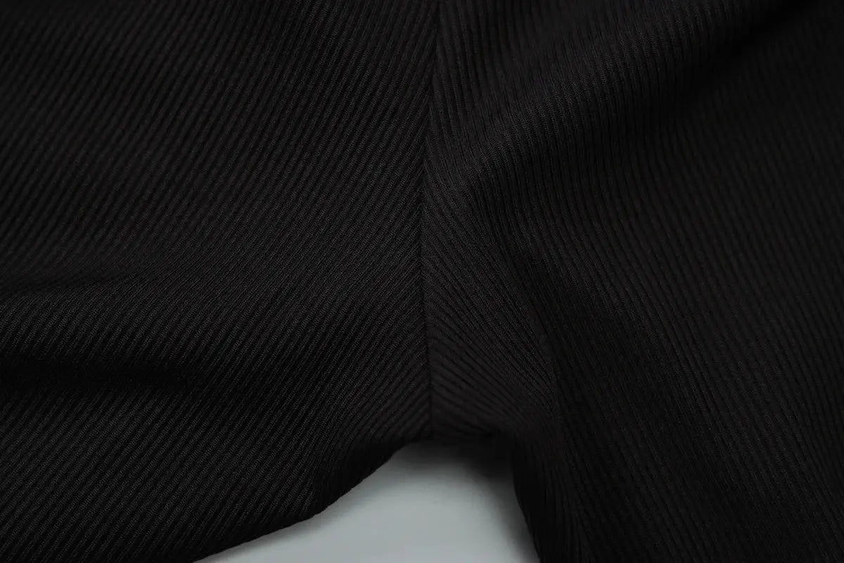 Hugcitar ribbed halter backless jumpsuit, black fabric by Simples Market