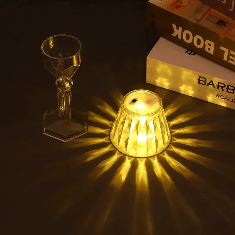 Mini crystal table lamp, battery-powered LED night light with warm yellow glow; shown with a crystal goblet