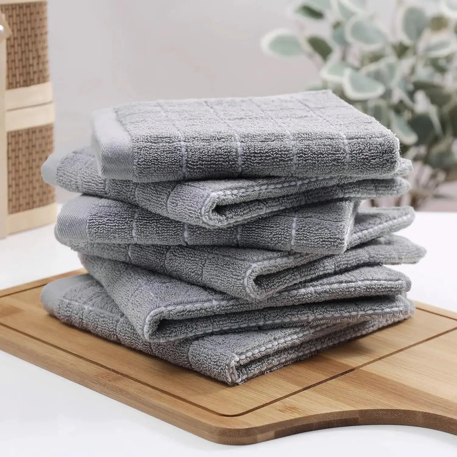 Simples Market 6-pack cotton terry dish cloths, ultra-soft gray, 12x12 in, stacked on a wooden board.
