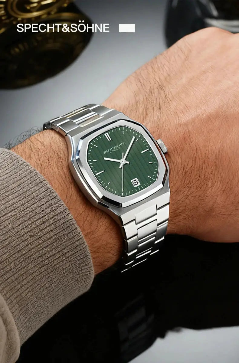 Specht&Sohne stainless steel watch with green dial, automatic movement, date window, 50m water resistant.