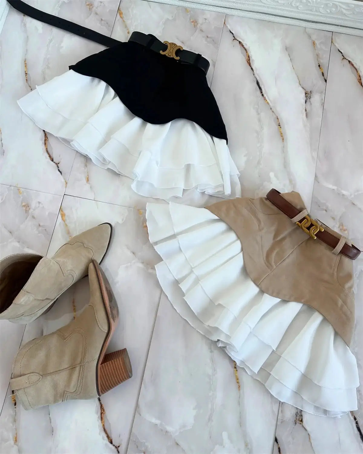 Chic Ruffles midi skirts, high-waisted with white layered ruffles; 2 colorways shown (black and beige) with tan boots