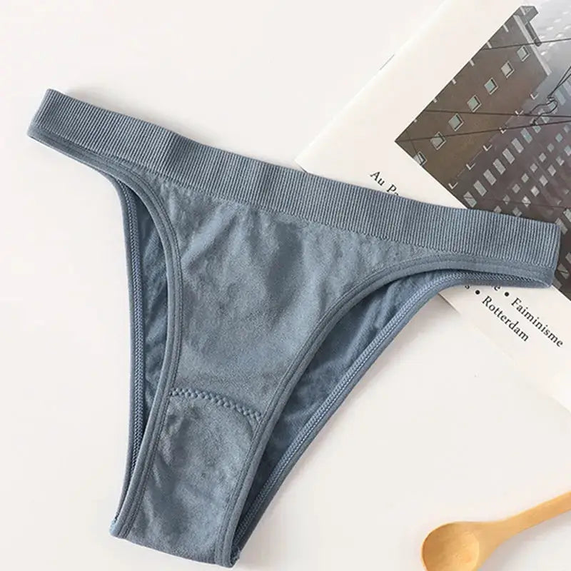 Women ribbed low-rise thong underwear in light blue with breathable cotton gusset.