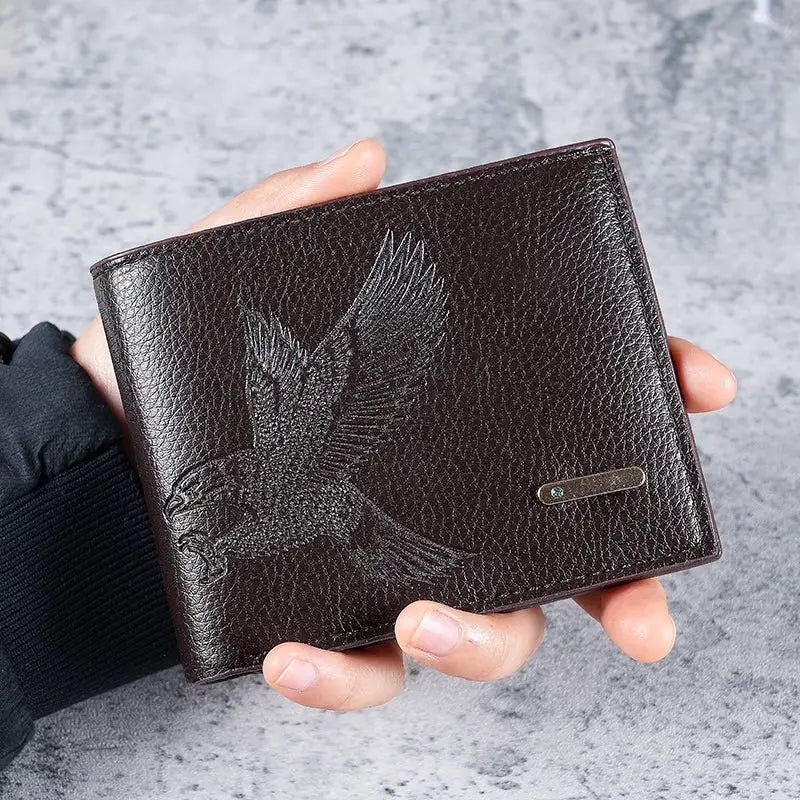 Short men's wallet in dark brown soft leather with eagle embossing, slim design