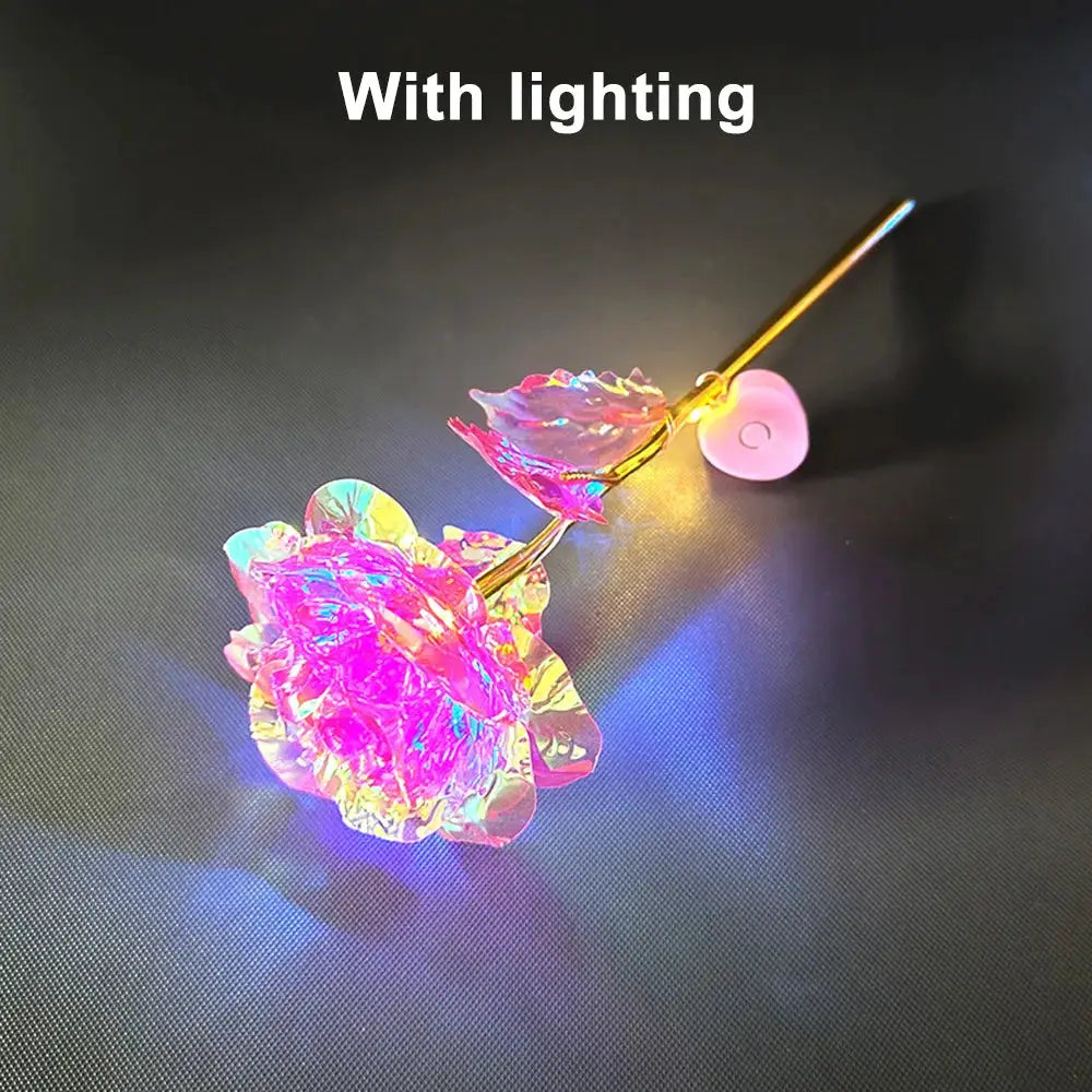 Led 24K foil-plated rose from Simples Market; iridescent artificial flower with pink bead on stem